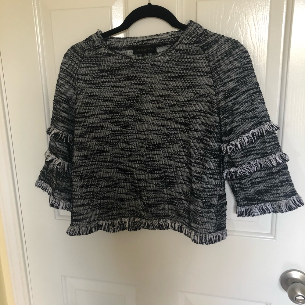 Black and white cropped sweater with fringe